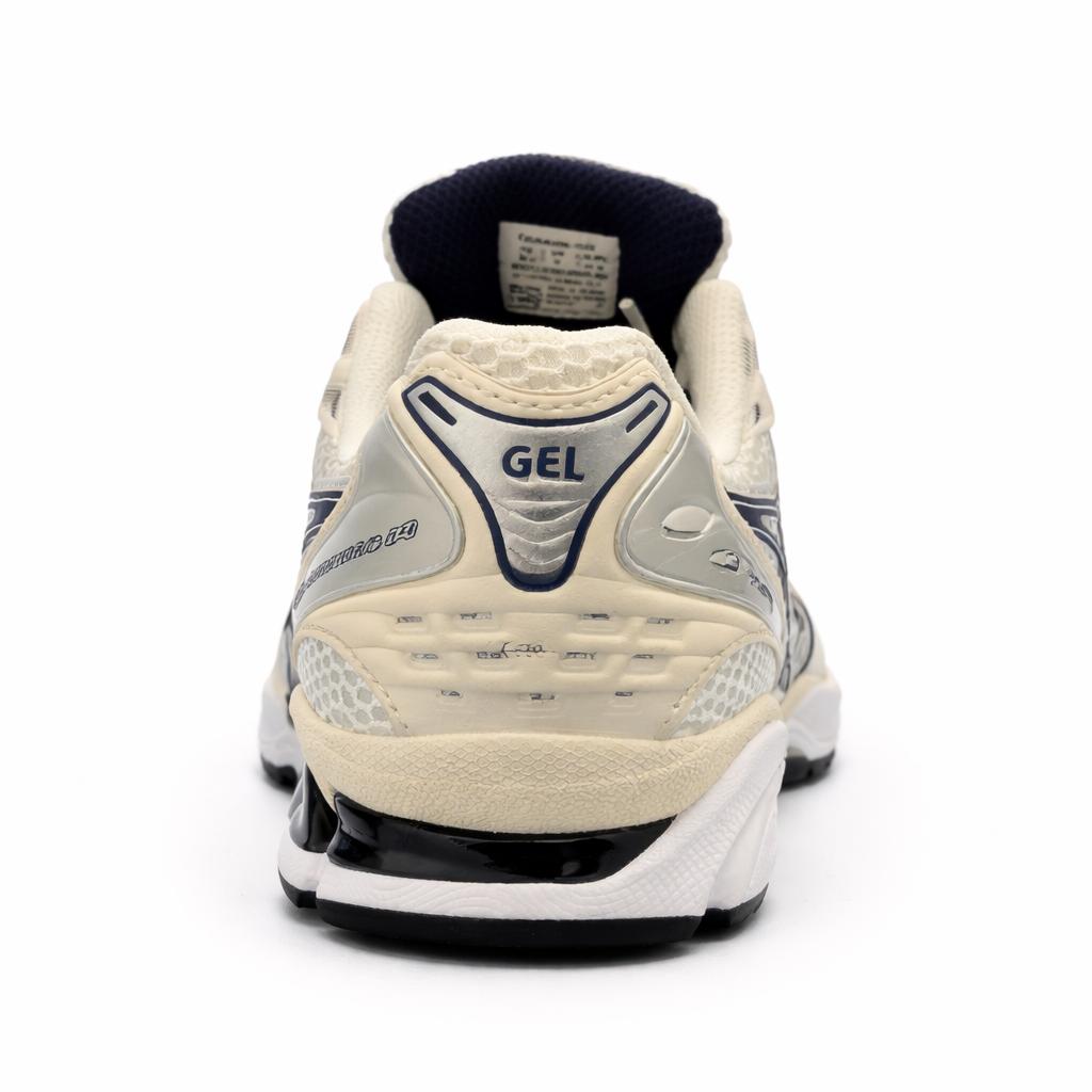 Asics Gel-Kayano 14 running shoe in the white and midnight